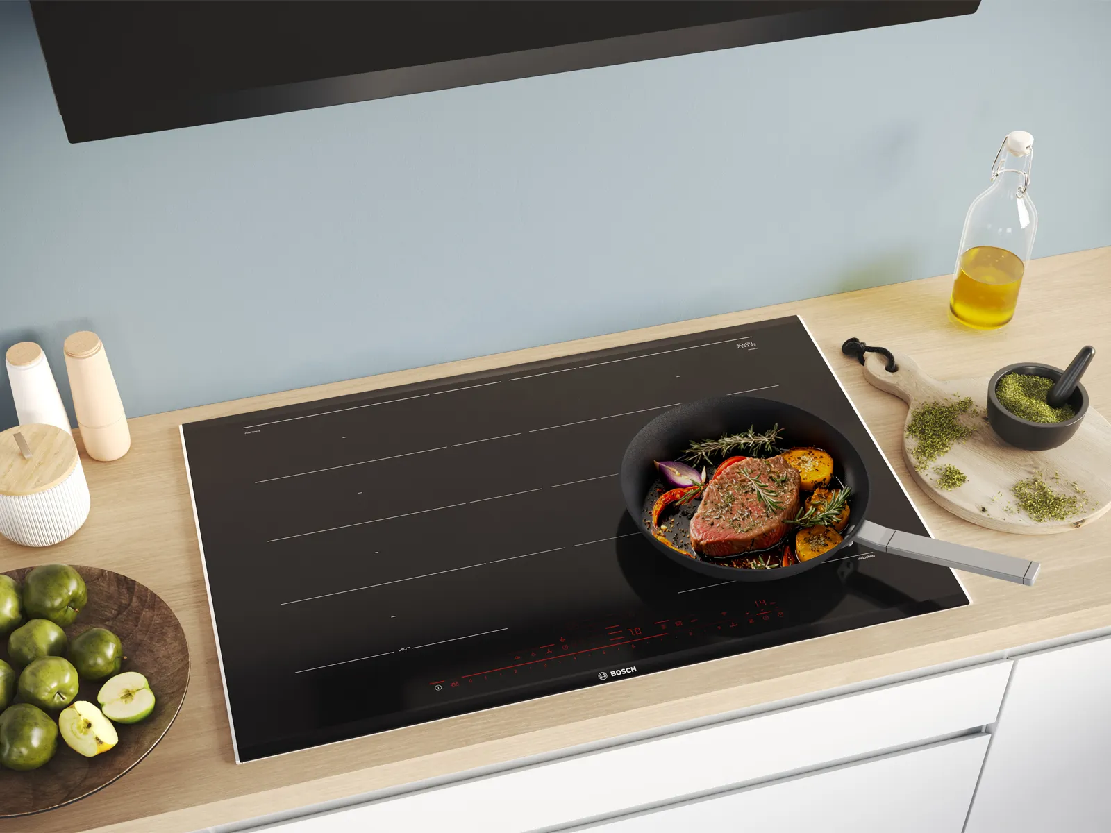 Bosch induction hob with food cooking