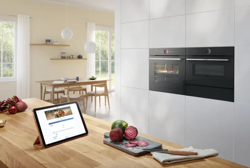 Bosch built-in ovens in a bright kitchen with a food preparation worktop